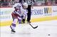 Oct 3, 2013; Glendale, AZ, USA; New York Rangers defenseman Michael Del Zotto (4) shoots the puck during the second period against the Phoenix Coyotes at Jobing.com Arena. Mandatory Credit: Matt Kartozian-USA TODAY Sports