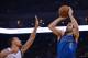 December 11, 2013; Oakland, CA, USA; Dallas Mavericks point guard Jose Calderon (8) shoots the ball against Golden State Warriors point guard Stephen Curry (30) during the first quarter at Oracle Arena. Mandatory Credit: Kyle Terada-USA TODAY Sports