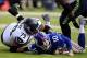 Unfortunately for Eli Manning and the Giants, this has been a frequent sight.