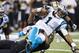 NEW ORLEANS, LA - DECEMBER 8: Cam Newton #1 of the Carolina Panthers is sacked during a game against the New Orleans Saints at Mercedes-Benz Superdome on December 8, 2013 in New Orleans, Louisiana. The Saints defeated the Panthers 31-13. (Photo by Wesl