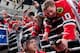 CHICAGO, IL - MAY 25: Patrick Kane #88 of the Chicago Blackhawks slaps hands with a fan while walking out to the ice before Game Five of the Western Conference Semifinals against the Detroit Red Wings during the 2013 Stanley Cup Playoffs at the United Cen
