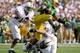 RB Ricky Whittle and the Ducks put up a fight, but No. 2 Penn State was too much for the Ducks in the 1995 Rose Bowl.