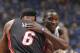 ORLANDO, FL - NOVEMBER 20: Victor Oladipo #5 of the Orlando Magic greets LeBron James #6 of the Miami Heat during the game on November 20, 2013 at Amway Center in Orlando, Florida. NOTE TO USER: User expressly acknowledges and agrees that, by downloading