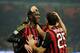 MILAN, ITALY - DECEMBER 16: Cristian Zapata of AC Milan (L) celebrates scoring the first goal during the Serie A match between AC Milan and AS Roma at San Siro Stadium on December 16, 2013 in Milan, Italy. (Photo by Claudio Villa/Getty Images)