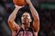 PORTLAND, OR - NOVEMBER 22: Derrick Rose #1 of the Chicago Bulls shoots the ball during the game against the Portland Trail Blazers on November 22, 2013 at the Moda Center Arena in Portland, Oregon. NOTE TO USER: User expressly acknowledges and agrees th
