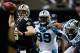 NEW ORLEANS, LA - DECEMBER 08: Drew Brees #9 of the New Orleans Saints throws a pass under pressure from Kawann Short #99 and Wes Horton #96 of the Carolina Panthers at Mercedes-Benz Superdome on December 8, 2013 in New Orleans, Louisiana. (Photo by C