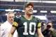 Dec 15, 2013; Arlington, TX, USA; Green Bay Packers quarterback Matt Flynn (10) smiles as he leaves the field after the game against the Dallas Cowboys at AT&T Stadium. Packers beat Cowboys 37-36. Mandatory Credit: Tim Heitman-USA TODAY Sports