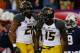 ATLANTA, GA - DECEMBER 07: Dorial Green-Beckham #15 of the Missouri Tigers celebrates scoring a touchdown with teammate Bud Sasser #21 in the second quarter against the Auburn Tigers during the SEC Championship Game at Georgia Dome on December 7, 2013 i