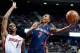 Dec 8, 2013; Auburn Hills, MI, USA; Detroit Pistons point guard Brandon Jennings (7) goes to the basket against Miami Heat center Chris Bosh (1) during the fourth quarter at The Palace of Auburn Hills. Miami won 110-95. Mandatory Credit: Tim Fuller-USA TO