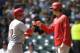 MILWAUKEE, WI - SEPTEMBER 14: Shin-Soo Choo #17 of the Cincinnati Reds celebrates with Homer Bailey #34 at hitting a two run homer in the top of the second inning against the Milwaukee Brewers at Miller Park on September 14, 2013 in Milwaukee, Wisconsin.