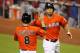 MIAMI, FL - APRIL 28: Giancarlo Stanton #27 of the Miami Marlins celebrates a two run home run against the Chicago Cubs with teammate Chris Coghlan #8 at Marlins Park on April 28, 2013 in Miami, Florida. (Photo by Marc Serota/Getty Images)