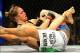 Feb 23, 2013; Anaheim, CA, USA; Ronda Rousey (black shorts) and Liz Carmouche (white shorts) fight during their UFC women's world bantamweight championship bout at the Honda Center. Mandatory Credit: Jayne Kamin-Oncea-USA TODAY Sports