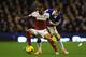 LIVERPOOL, ENGLAND - DECEMBER 14: Ashkan Dejagah of Fulham competes with Seamus Coleman of Everton during the Barclays Premier League match between Everton and Fulham at Goodison Park on December 14, 2013 in Liverpool, England. (Photo by Chris Brunskill/