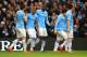 MANCHESTER, ENGLAND - DECEMBER 14: Fernandinho of Manchester City celebrates with team mates after scoring their third goal during the Barclays Premier League match between Manchester City and Arsenal at Etihad Stadium on December 14, 2013 in Manchester,