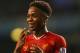 LONDON, ENGLAND - DECEMBER 15: Raheem Sterling of Liverpool celebrates scoring their fifth goal during the Barclays Premier League match between Tottenham Hotspur and Liverpool at White Hart Lane on December 15, 2013 in London, England. (Photo by Paul Gi