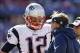 Sep 8, 2013; Orchard Park, NY, USA; New England Patriots quarterback Tom Brady (12) talks with head coach Bill Belichick late in the fourth quarter against the Buffalo Bills at Ralph Wilson Stadium. Patriots beat the Bills 23-21. Mandatory Credit: Kevin H