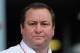 CARDIFF, WALES - OCTOBER 05: Newcastle owner Mike Ashley looks on before the Barclays Premier League match between Cardiff City and Newcastle United at Cardiff City Stadium on October 5, 2013 in Cardiff, Wales. (Photo by Stu Forster/Getty Images)