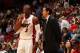 MIAMI, FL - NOVEMBER 12: Erik Spoelstra, Head Coach of the Miami Heat shares a word with Dwyane Wade #3 during the game against the Milwaukee Bucks on November 12, 2013 at American Airlines Arena in Miami, Florida. NOTE TO USER: User expressly acknowledge