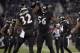 BALTIMORE, MD - NOVEMBER 28: Strong safety James Ihedigbo #32 and inside linebacker Josh Bynes #56 of the Baltimore Ravens celebrate a play against the Pittsburgh Steelers at M&T Bank Stadium on November 28, 2013 in Baltimore, Maryland. The Baltimore Rave