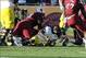 Michigan's Vincent Smith was separated from his helmet and the football by Jadeveon Clowney's big hit in the Outback Bowl.