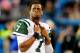 CHARLOTTE, NC - DECEMBER 15: Geno Smith #7 of the New York Jets watches the scoreboard during the final minute of a loss to the Carolina Panthers at Bank of America Stadium on December 15, 2013 in Charlotte, North Carolina. The Panthers won 30-20. (Phot