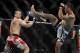 May 15, 2012; Fairfax, VA, USA; Brad Tavares (right) misses a high kick to Dongi Yang (left) during the Korean zombie vs Poirier event at Patriot Center. Mandatory Credit: Rafael Suanes-USA TODAY Sports
