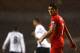 LONDON, ENGLAND - DECEMBER 15: Captain Luis Suarez of Liverpool looks on through the rain during the Barclays Premier League match between Tottenham Hotspur and Liverpool at White Hart Lane on December 15, 2013 in London, England. (Photo by Paul Gilham/
