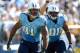 SAN DIEGO, CA - SEPTEMBER 16: Derrick Morgan #91 of the Tennessee Titans celebrates his sack against the San Diego Chargers in front of Jurrell Casey #99 during the second quarter at Qualcomm Stadium on September 16, 2012 in San Diego, California. (Pho