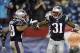 Sep 12, 2013; Foxborough, MA, USA; New England Patriots cornerback Aqib Talib (31) celebrates with strong safety Steve Gregory (28) after an interception during the fourth quarter against the New York Jets at Gillette Stadium. The New England Patriots wo