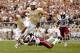 ORLANDO, FL - SEPTEMBER 28: Kadetrix Marcus #25 of the South Carolina Gamecocks trips up Blake Bortles #5 of the Central Florida Knights during a game at Bright House Networks Stadium on September 28, 2013 in Orlando, Florida. South Carolina won the gam