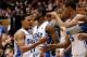 Dec 16, 2013; Durham, NC, USA; Duke Blue Devils guard Quinn Cook (2) greets teammates forward Amile Jefferson (21) and forward Josh Hairston (15) and forward Rodney Hood (5) after coming out of the game against the Gardner Webb Runnin Bulldogs at Cameron