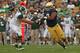 SOUTH BEND, IN - SEPTEMBER 21: Stephon Tuitt #7 of the Notre Dame Fighting Irish rushes against Jack Conklin #74 of the Michigan State Spartans at Notre Dame Stadium on September 21, 2013 in South Bend, Indiana. Notre Dame defeated Michigan State 17-13.