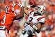 CLEMSON, SC - OCTOBER 20: Vic Beasley #3 of the Clemson Tigers goes after Logan Thomas #3 of the Virginia Tech Hokies as he tries to pass the ball during their game at Clemson Memorial Stadium on October 20, 2012 in Clemson, South Carolina. (Photo by St