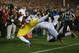 LOS ANGELES, CA - NOVEMBER 16: Wide receiver Marqise Lee #9 of the USC Trojans catches a pass for a two-point conversion, while being tackled by safety Jordan Richards #8 of the Stanford Cardinal in the first half at Los Angeles Coliseum on November 16,