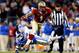 CHARLOTTE, NC - DECEMBER 07: Wide receiver Kelvin Benjamin #1 of the Florida State Seminoles runs with the ball as cornerback Deondre Singleton #33 of the Duke Blue Devils defends during the ACC Championship game at Bank of America Stadium on December 7,