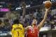Dec 20, 2013; Indianapolis, IN, USA; Houston Rockets forward Chandler Parson (25) takes a shot against Indiana Pacers guard Lance Stephenson (1) at Bankers Life Fieldhouse. Mandatory Credit: Brian Spurlock-USA TODAY Sports