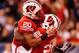 INDIANAPOLIS, IN - DECEMBER 01: Melvin Gordon #25 of the Wisconsin Badgers celebrates a first quarter touchdown with James White #20 while playing the Nebraska Cornhuskers during the Big 10 Conference Championship Game at Lucas Oil Stadium on December 1,