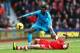 SOUTHAMPTON, ENGLAND - DECEMBER 22: Kyle Walker of Spurs is tackled by Morgan Schneiderlin of Southampton during the Barclays Premier League match between Southampton and Tottenham Hotspur at St Mary's Stadium on December 22, 2013 in Southampton, England