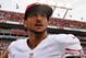TAMPA, FL - DECEMBER 15: Quarterback Colin Kaepernick #7 of the San Francisco 49ers leaves the field after play against the Tampa Bay Buccaneers December 15, 2013 at Raymond James Stadium in Tampa, Florida. The 49ers won 33 - 14. (Photo by Al Messersch