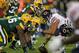 GREEN BAY, WI - NOVEMBER 04: Roberto Garza #63 of the Chicago Bears prepares to snaps the ball against the Green Bay Packers at Lambeau Field on November 4, 2013 in Green Bay, Wisconsin. The Bears defeated the Packers 27-20. (Photo by Jonathan Daniel/Ge