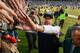EAST RUTHERFORD, NJ - DECEMBER 22: Head coach Rex Ryan of the New York Jets walks around shaking hands with fans at the end of the New York Jets 24-13 win over the Cleveland Browns at MetLife Stadium on December 22, 2013 in East Rutherford, New Jersey.