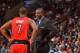 PHILADELPHIA, PA - NOVEMBER 20: Dwane Casey of the Toronto Raptors speaks with Kyle Lowry #7 during the game against the Philadelphia 76ers at the Wells Fargo Center on November 20, 2013 in Philadelphia, Pennsylvania. NOTE TO USER: User expressly acknowl