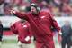 LITTLE ROCK, ARKANSAS - NOVEMBER 23: Head Coach Bret Bielema of the Arkansas Razorbacks points to a official during a game against the Mississippi State Bulldogs at War Memorial Stadium on November 23, 2013 in Little Rock, Arkansas. The Bulldogs defeate