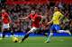 MANCHESTER, ENGLAND - DECEMBER 07: Phil Jones of Manchester United is pursued by Yohan Cabaye of Newcastle during the Barclays Premier League match between Manchester United and Newcastle United at Old Trafford on December 7, 2013 in Manchester, England.