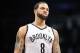 Dec 18, 2013; Brooklyn, NY, USA; Brooklyn Nets point guard Deron Williams (8) looks on in the final moments against the Washington Wizards during the second half at Barclays Center. The Wizards won the game 113-107. Mandatory Credit: Joe Camporeale-USA TO