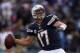 SAN DIEGO, CA - DECEMBER 08: Quarterback Philip Rivers #17 of the San Diego Chargers drops back to pass against the New York Giants in the second half at Qualcomm Stadium on December 8, 2013 in San Diego, California. The Chargers defeated the Giants 37-1