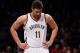 NEW YORK, NY - DECEMBER 12: Brook Lopez #11 of the Brooklyn Nets looks on during the first half against the Los Angeles Clippers at Barclays Center on December 12, 2013 in the Brooklyn borough of New York City. NOTE TO USER: User expressly acknowledges a