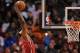 Dec 20, 2013; Miami, FL, USA; Miami Heat small forward LeBron James (6) dunks the ball against the Sacramento Kings during the first half at American Airlines Arena. Mandatory Credit: Steve Mitchell-USA TODAY Sports
