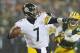Dec 22, 2013; Green Bay, WI, USA; Pittsburgh Steelers quarterback Ben Roethlisberger (7) throws a pass during the fourth quarter against the Green Bay Packers at Lambeau Field. Pittsburgh won 38-31. Mandatory Credit: Jeff Hanisch-USA TODAY Sports