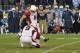 NASHVILLE, TN - DECEMBER 15: Dave Zastudil #9 holds as Jay Feely #4 of the Arizona Cardinals kicks the game winning overtime field goal to defeat the Tennessee Titans 37-34 at LP Field on December 15, 2013 in Nashville, Tennessee. (Photo by Frederick Br